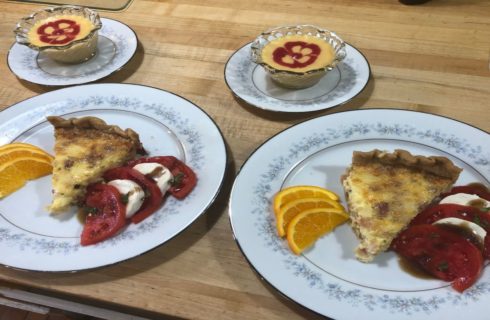 plate with quiche, caprese salad and peach soup
