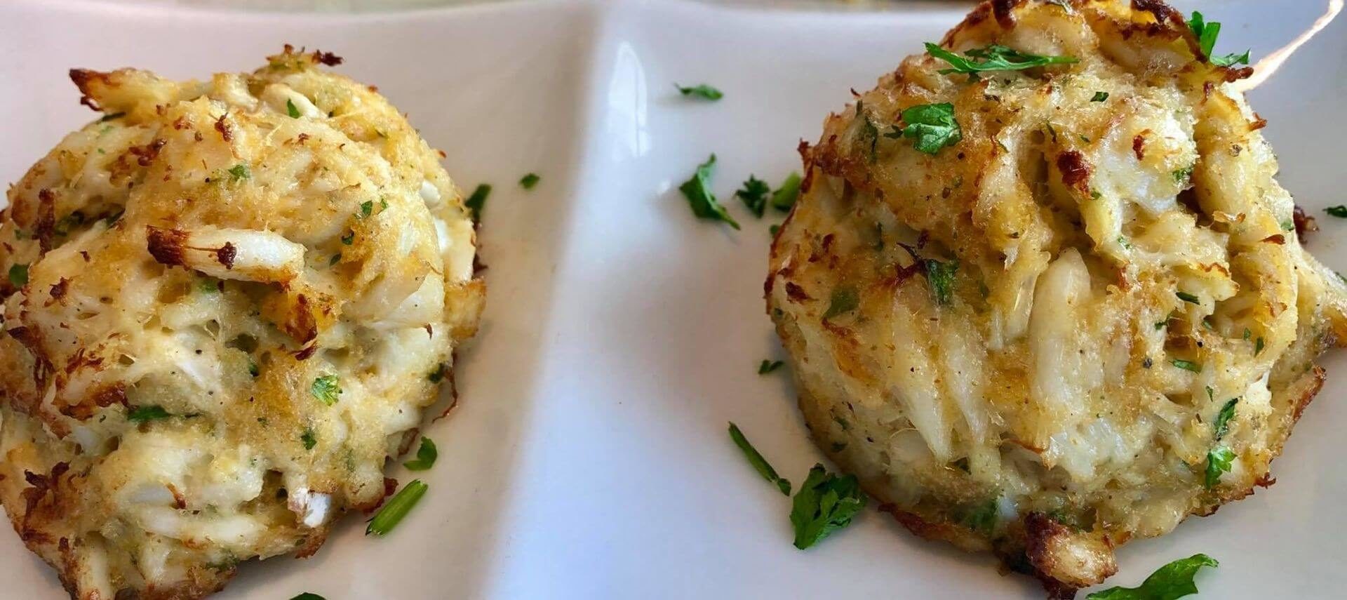 two crab cakes on a plate