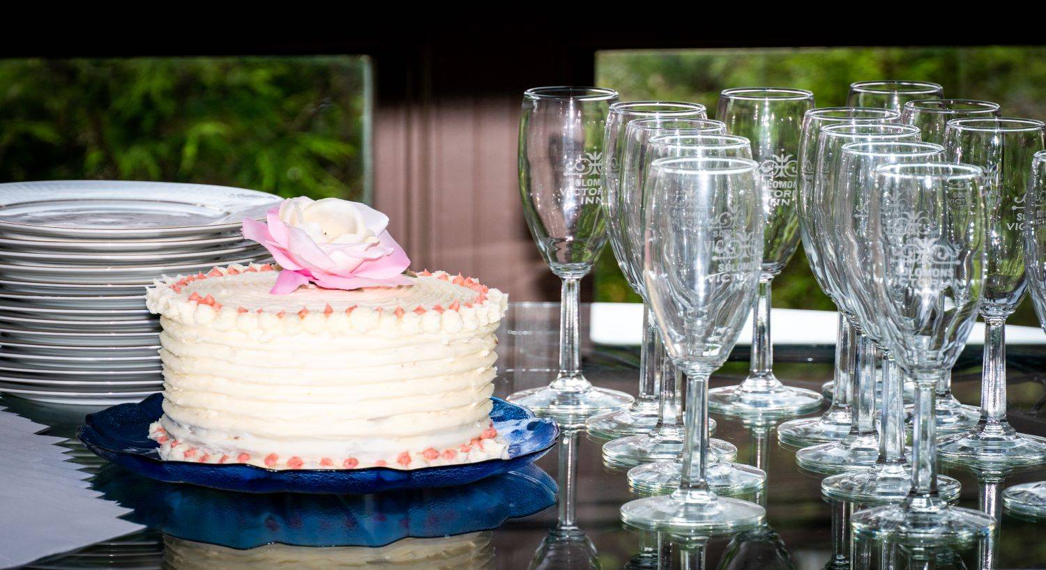 small wedding cake and champagne glasses